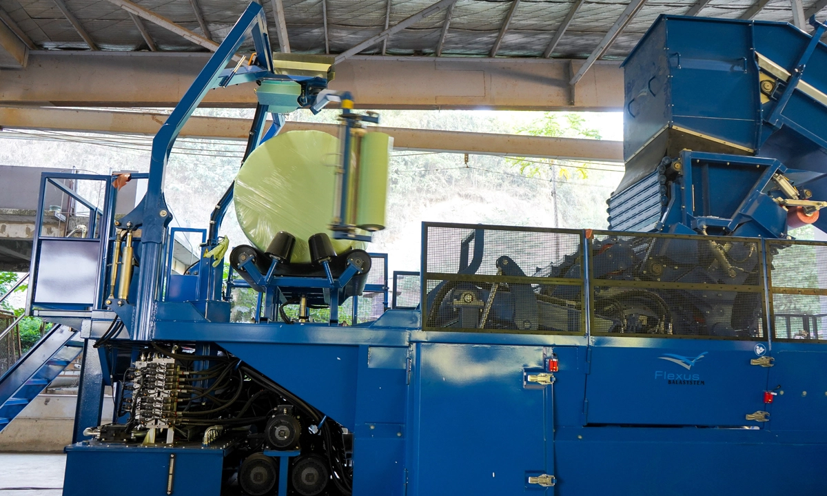 Inside Prime Waste Solutions Cebu’s materials recovery facility, a baling system compacts waste to reduce methane emissions, maximize space, and allow long-term storage. The facility is focused on resource recovery and can process up to 1,000 tons of waste per day.