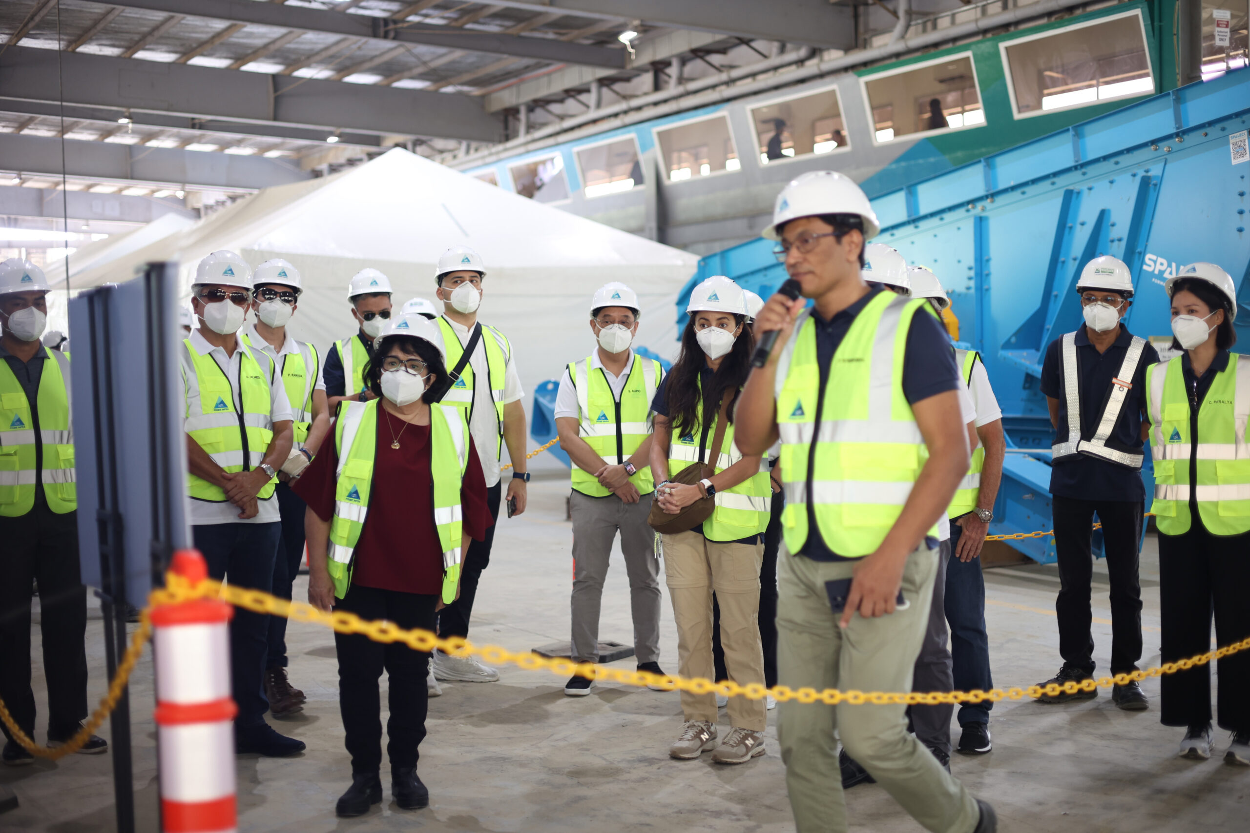 DENR Secretary Ma. Antonia Yulo-Loyzaga listens to the tour during the inauguration of Prime Integrated Waste Solutions’ Materials Recovery Facility in Cebu.